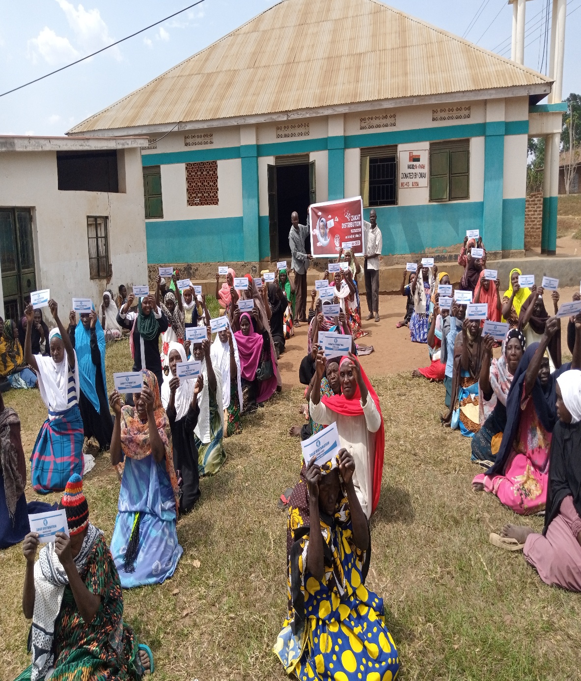 Beneficiaries and volunteers during a program